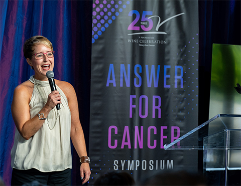 Susanna Greer, chief scientific officer of the V Foundation and co-founder of the ASBMB Art of Science Communication course, speaks at the 25th Anniversary V Foundation Wine Celebration, where the foundation raised $21 million for cancer research.