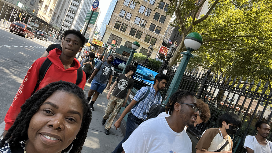 Pollard snaps a selfie during a field trip with STEP students in New York City.