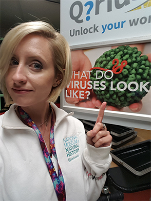 Shauna Bennett volunteers at the Smithsonian Museum of Natural History in 2019, where she discusses viruses with museum visitors.