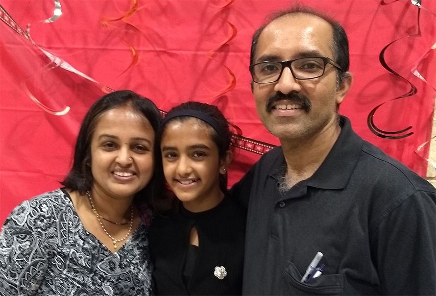 Rajendra Upadhya with his wife and daughter.