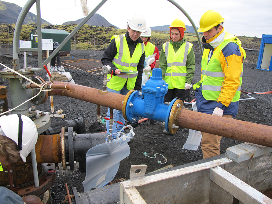 The IPGP research group collect samples at the Hellisheiði geothermal plant in 2012 for microbial analysis. Left to right: Bénédicte Ménez, Rosalia Trias, Emmanuelle Gérard and Paul Le Campion.