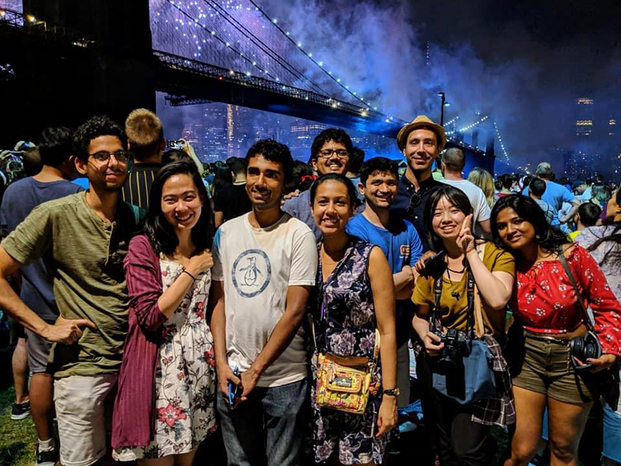 Krishnakoli Adhikary, right and a group of One To World friends celebrate July 4th, 2019 at the Brooklyn Bridge