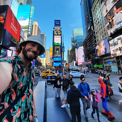 Horacio Pallares takes a selfie in Times Square while visiting New York City during his PROLAB stint in 2022 at the Stowers Institute for Medical Research.